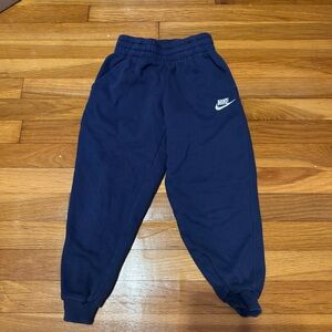 kids navy blue nike joggers